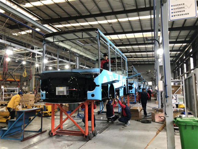 مینی بس الکتریکی 7 متری با 200 کیلومتر مایل رانندگی و فرمان LHD برای حمل و نقل عمومی